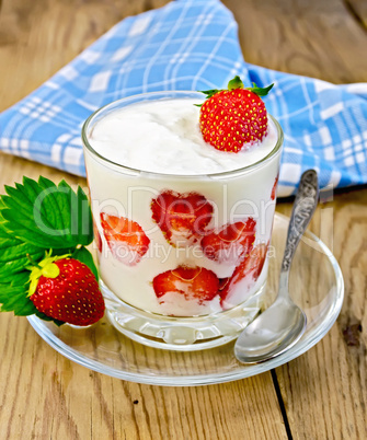 yogurt thick with strawberries on a board