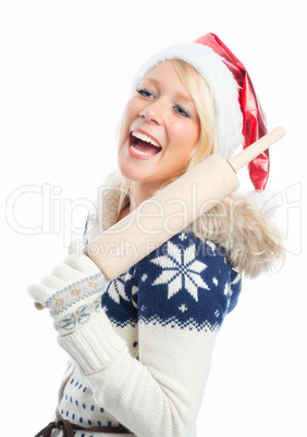 blonde weihnachtsfrau mit nudelholz