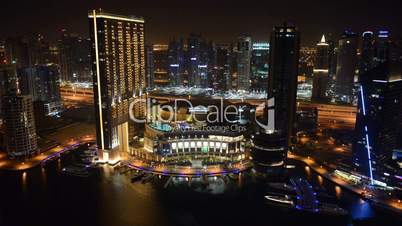 The night illumination of Dubai Marina. It is an artificial canal city, built along a two mile (3 km) stretch of Persian Gulf shoreline. Dubai, UAE