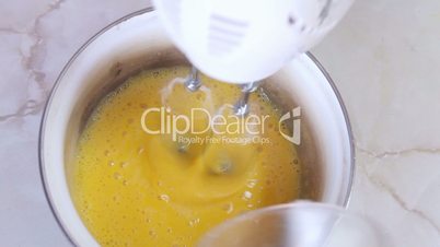 blending egg yolks and sugar