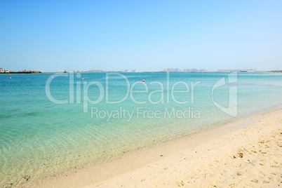 beach of the luxury hotel with a view on palm jumeirah man-made