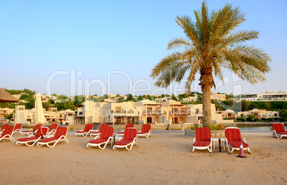 beach of the luxury hotel during sunset, ras al khaima, uae