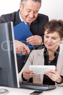 Employee shows their superiors Tablet PC