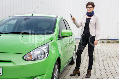 Woman with new car