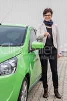 Woman with new car