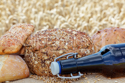 Bread and drinks bottle before Cornfield