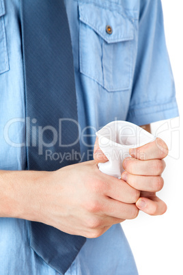 Hands crumpling paper cup