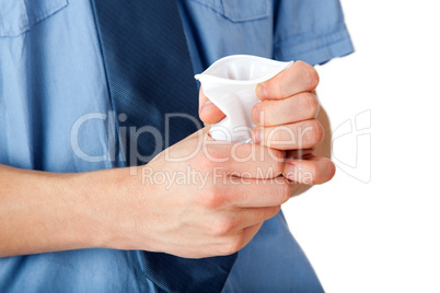 Hands crumpling paper cup