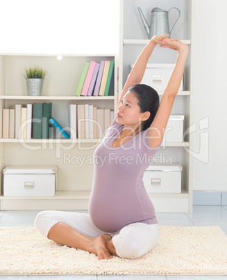 Woman doing relaxation yoga at home