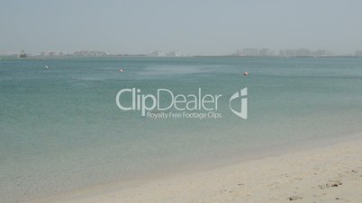 Beach of the luxury hotel with a view on Palm Jumeirah man-made island, Dubai, UAE