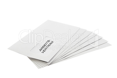 Arbeitsvertrag on a Batch of Envelopes isolated on White