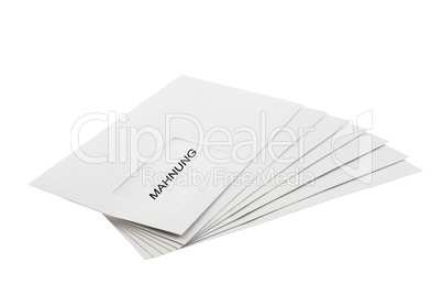 Mahnung on a Batch of Envelopes isolated on White