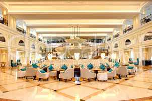 lobby interior of the luxury hotel in night illumination, ras al