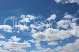 picturesque white clouds on blue sky background