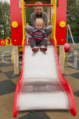 mother and son on playground