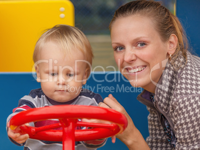 mother and son on playground