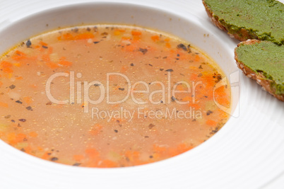 italian minestrone soup with pesto crostini on side