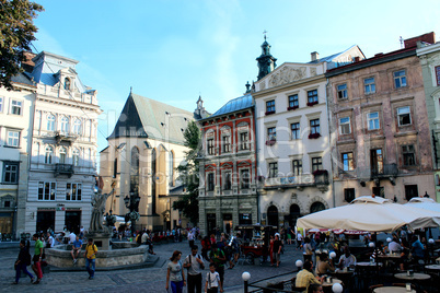 square with monument of neptune in lviv city