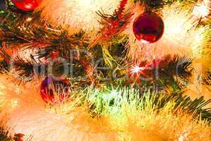 decorated christmas tree branch. toys, chocolate figurines, colo