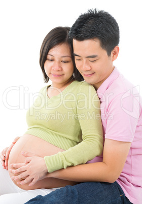 Affectionate Asian pregnant couple