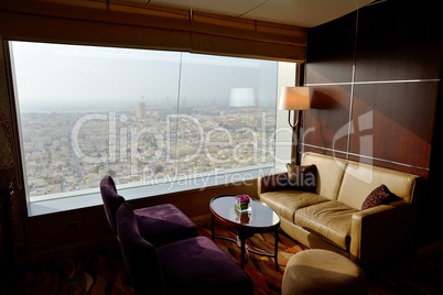 interior of the luxury hotel with a view on dubai city, uae