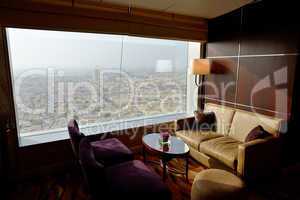 interior of the luxury hotel with a view on dubai city, uae