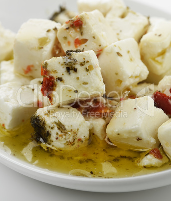 feta cheese with  oil and herbs