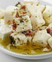 feta cheese with  oil and herbs