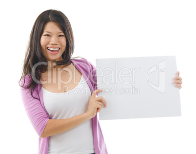 Asian woman showing a blank card board