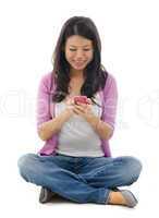 Young Woman texting on smart phone