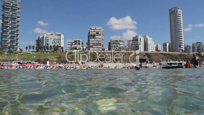 view of the beach from the sea. underwater view.