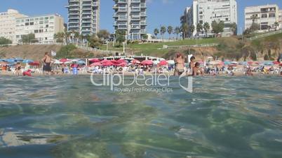 view of the beach from the sea. underwater view.