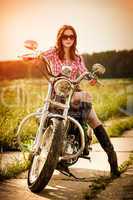 Biker girl and motorcycle