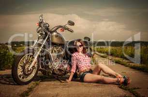 Biker girl and motorcycle