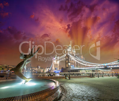 Tower Bridge and St Katharine Docks Girl with Dolphin fountain.