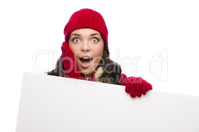 Shocked Girl Wearing Winter Hat and Gloves Holds Blank Sign