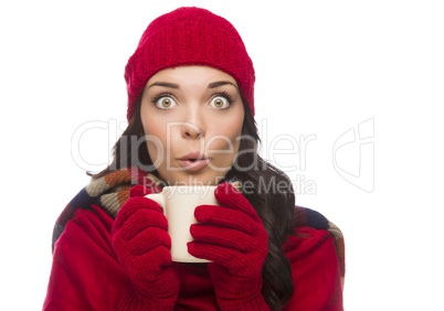 Wide Eyed Mixed Race Woman Wearing Winter Gloves Holds Mug