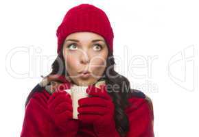 Mixed Race Woman Wearing Mittens Holds Mug Looks to Side