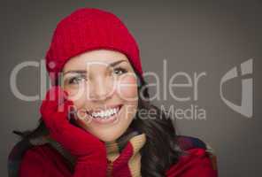 Smilng Mixed Race Woman Wearing Winter Hat and Gloves