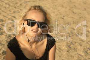 Young girl on the sandy beach