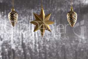 a group of christmas pine cone and star