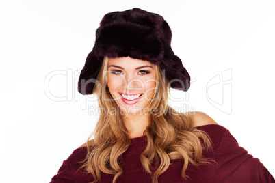 trendy blond woman in a black hat