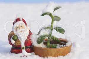Ceramic Santa Claus in the snow
