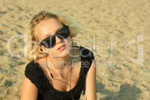 Teenage girl on the sandy beach