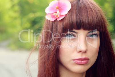 girl with flower in hair