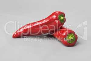 Red hot chilli peppers isolated on white background
