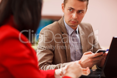 businessman listening to a colleague