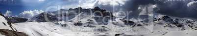 Panorama of snowy winter mountains