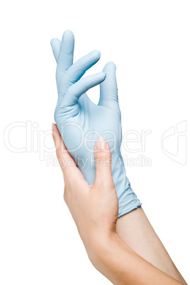 Woman hand putting on surgical glove