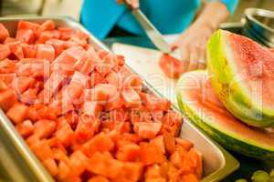 cutting a watermelon